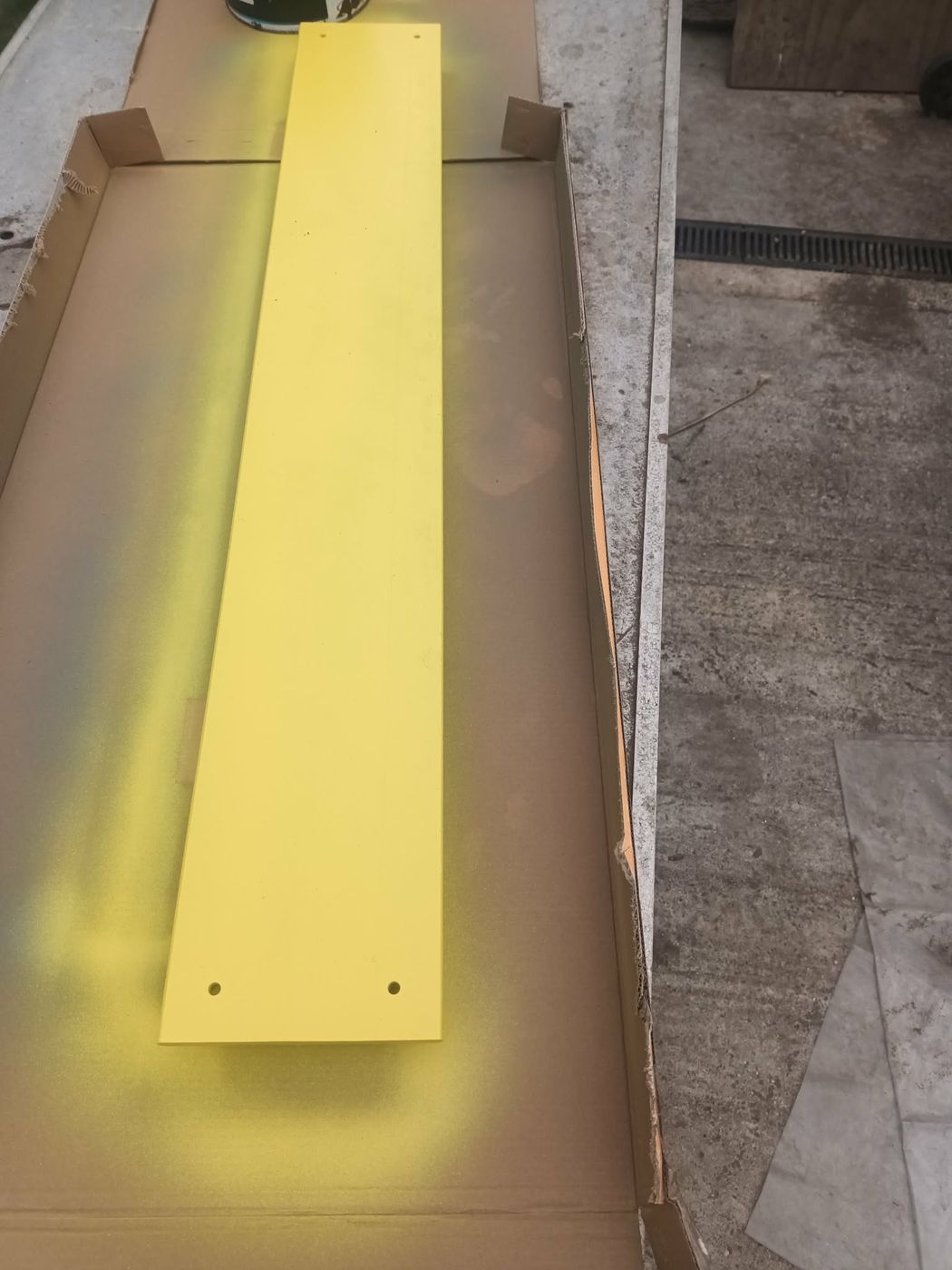 Onsite sprayed yellow safety panel, freshly finished