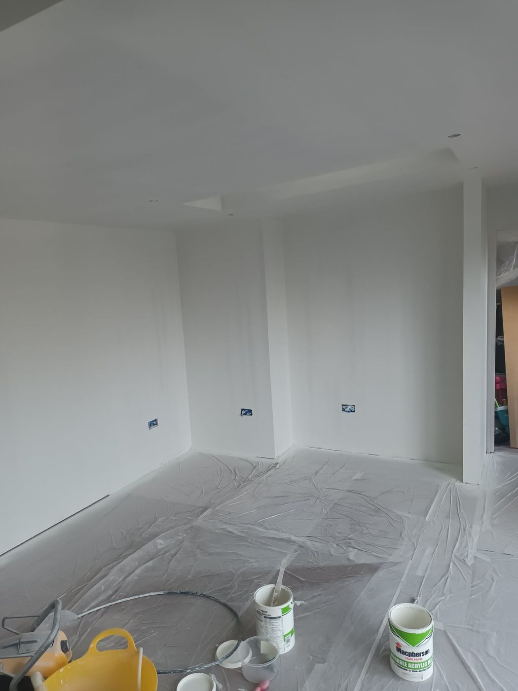 Freshly sprayed interior walls, finished white