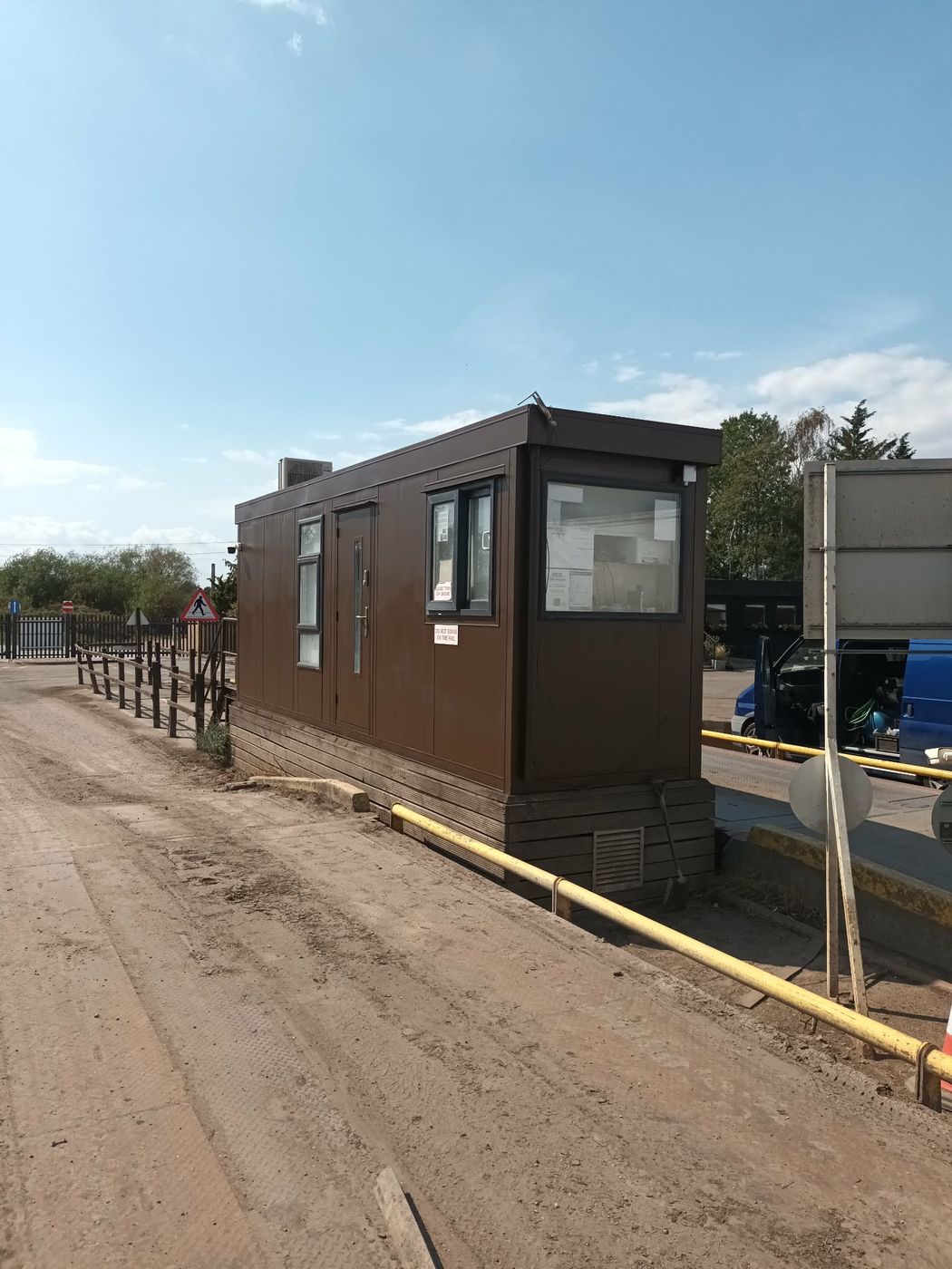 Site cabin after onsite respray in brown